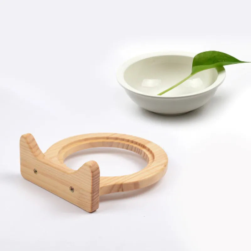 Elegant wall mounted cat bowl with a natural wooden frame and playful cloud design