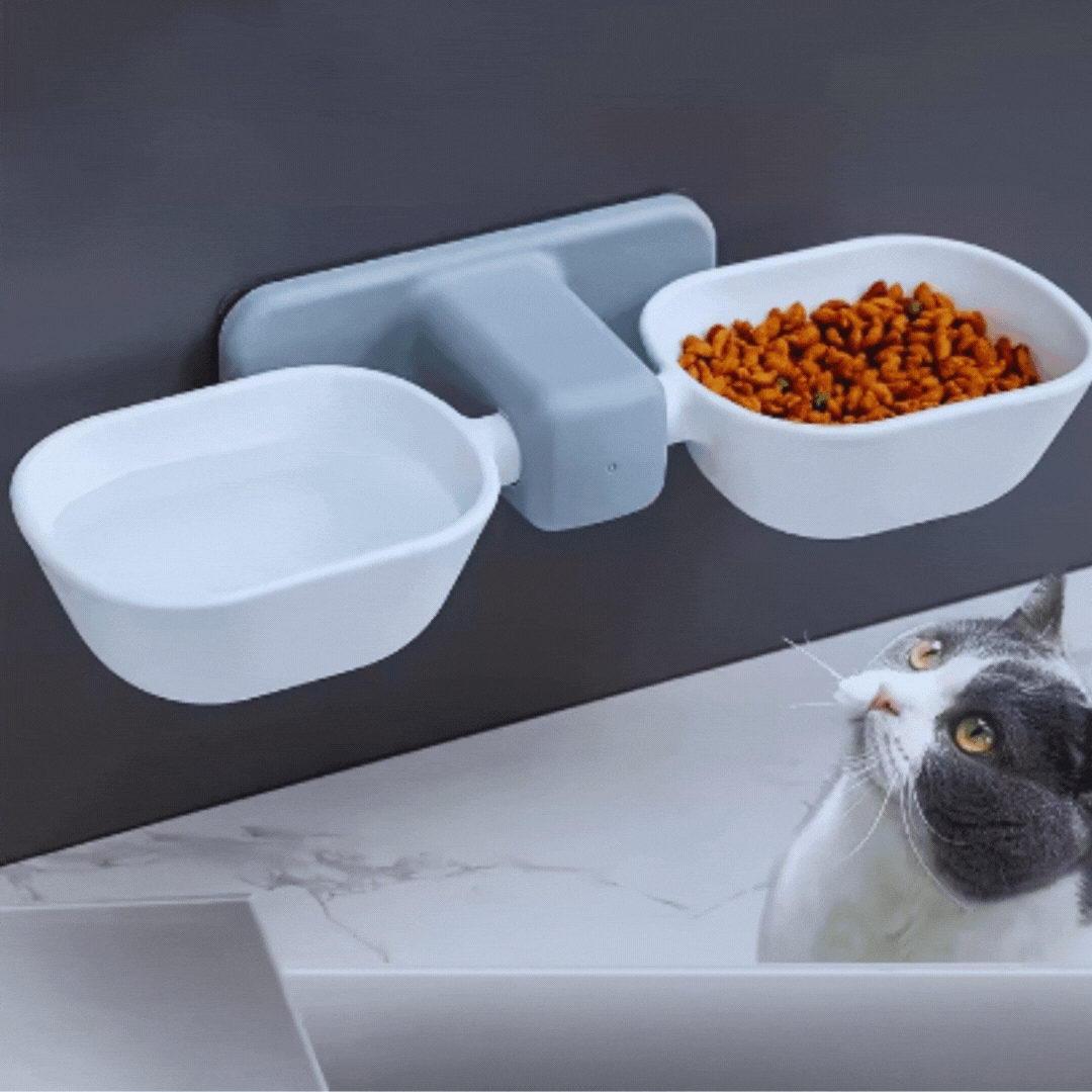 Wall mounted pet feeder with two stainless steel bowls for cat or dog food & water, space-saving design.
