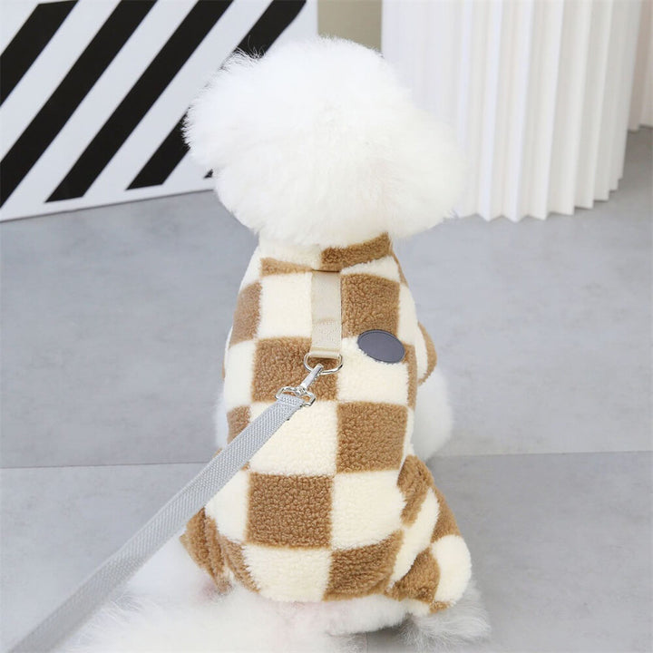 Functional and trendy checkered fleece dog jacket, D-ring included for secure adventures.