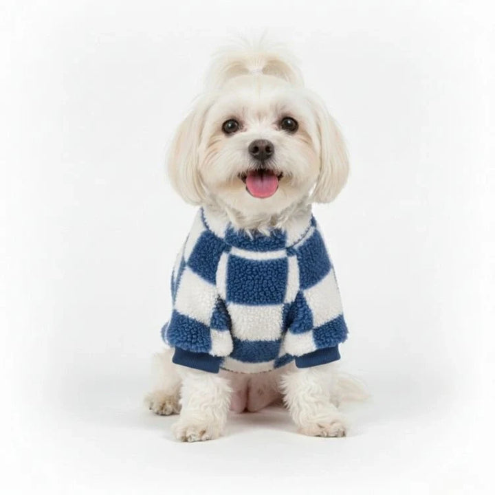 Dog fashion piece: checkered fleece jacket with D-ring, offering warmth and style for any dog.