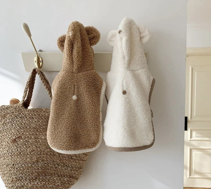 Close-up of cotton pet cape texture, showing warmth and quality design