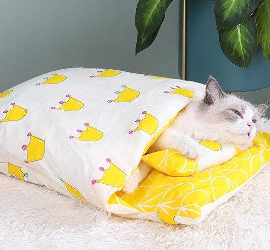 Cat sleeping bag pet bed in a neutral color, blending with home decor while offering pet comfort