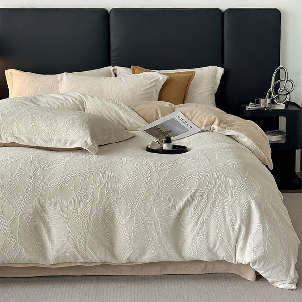 Bedroom elegance: embossed milk velvet sheet set with a stunning leaf pattern.