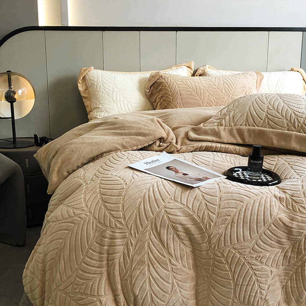 Luxury velvet sheet set featuring an elegant embossed leaf design, perfect for warm nights.