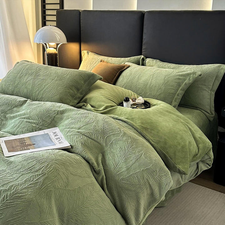 Comfortable milk velvet bedding set with sophisticated natural leaf embossing and warm feel.