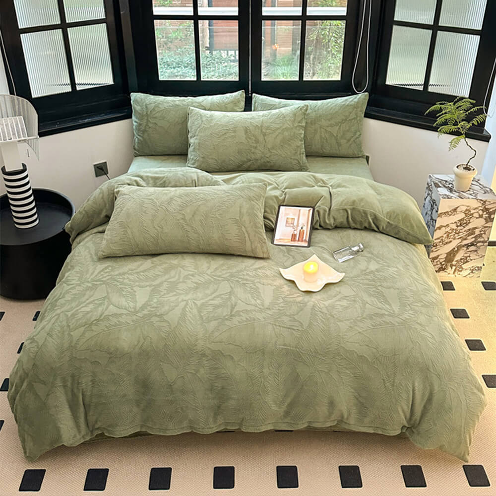 Velvet sheet set, embossed with elegant leaves, providing warmth and comfort.