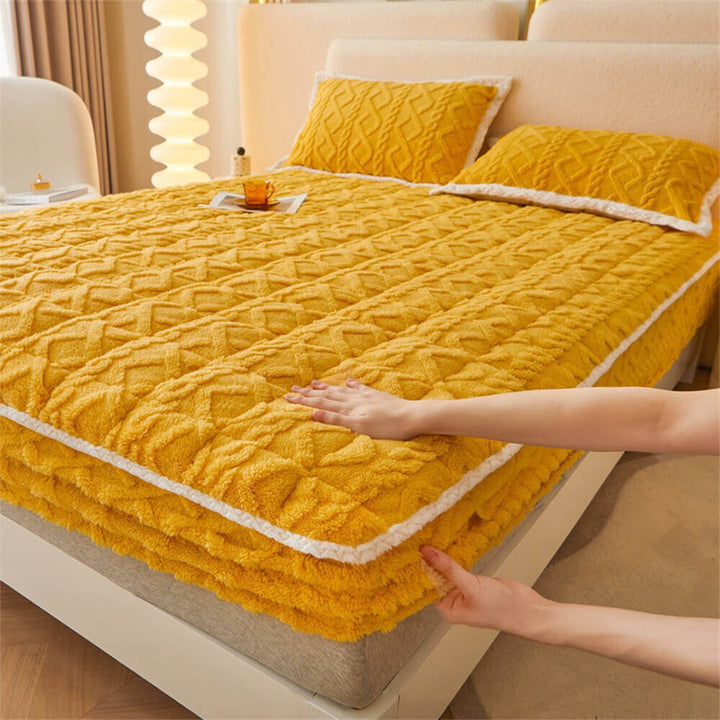 Close-up of a luxurious fluffy polyester mattress cover, showcasing its soft and warm texture.
