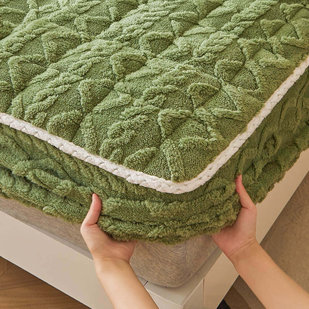 Fluffy polyester fitted sheet mattress cover, a cozy and washable addition to any bedroom.