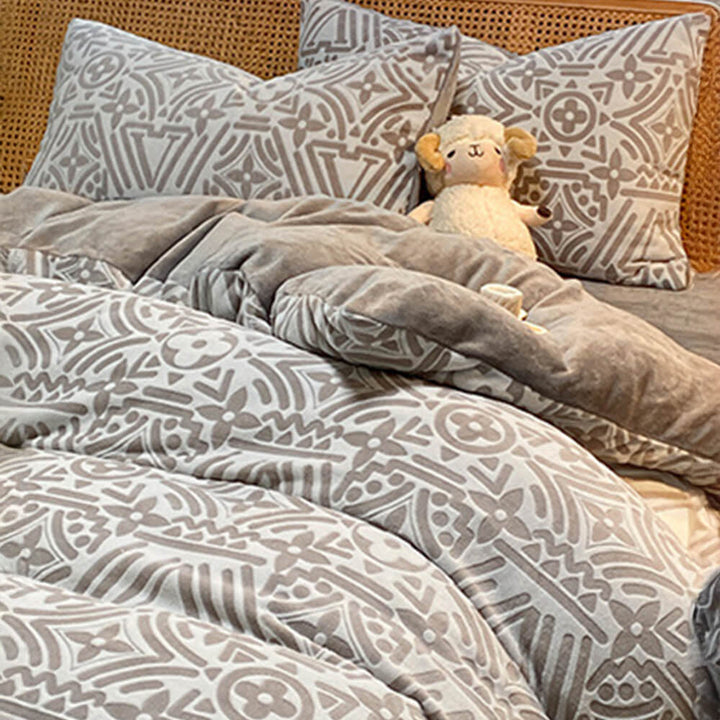 Classic geometric design on soft milk velvet bed sheets, enhancing bedroom comfort and decor.