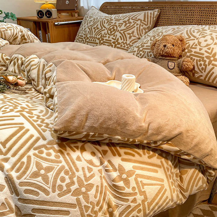 Premium milk velvet geometric bed sheet set, offering warmth, softness, and anti-static properties.