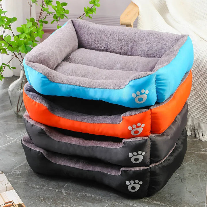Unisex waterproof bolster pet bed in a cozy living room setting, ideal for winter comfort and support.