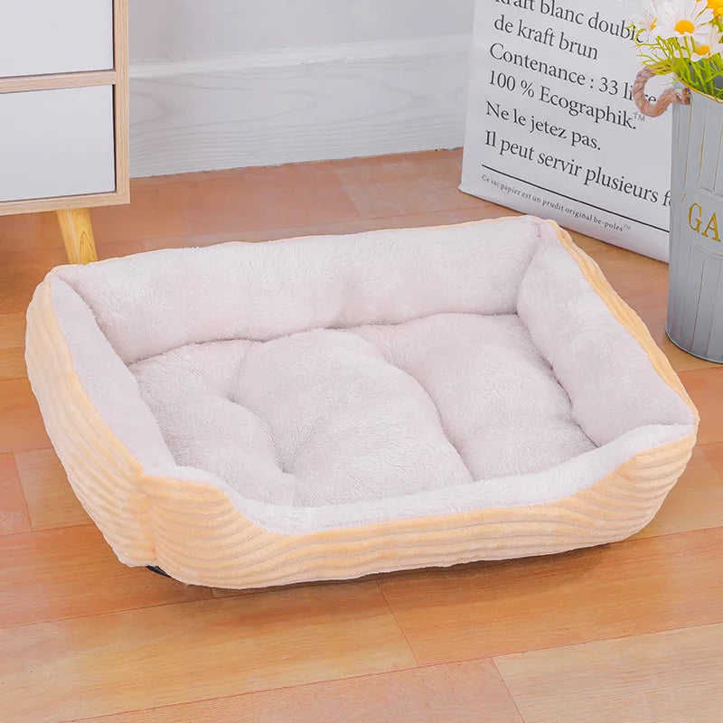 Waterproof dog bed, bolster type, designed for ultimate winter pet comfort and easy cleaning.