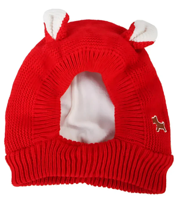Close-up of a knitted dog hat showing fabric detail and ear holes, warm and soft
