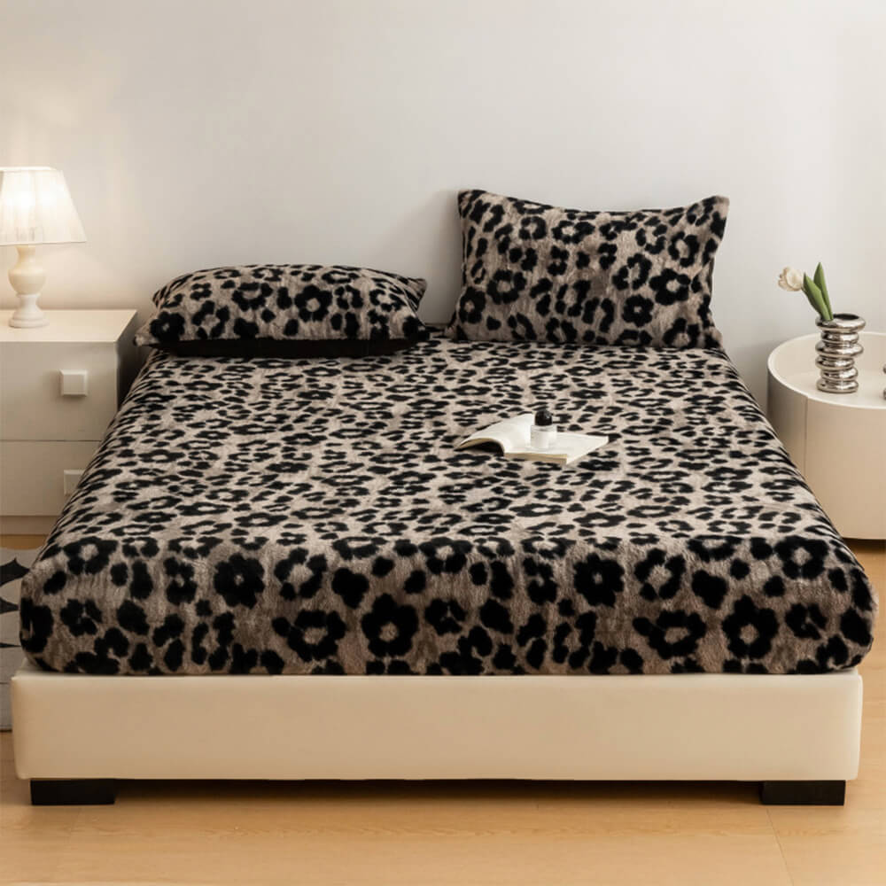 Cozy faux fur fitted sheet in striking leopard print, luxury bedding item