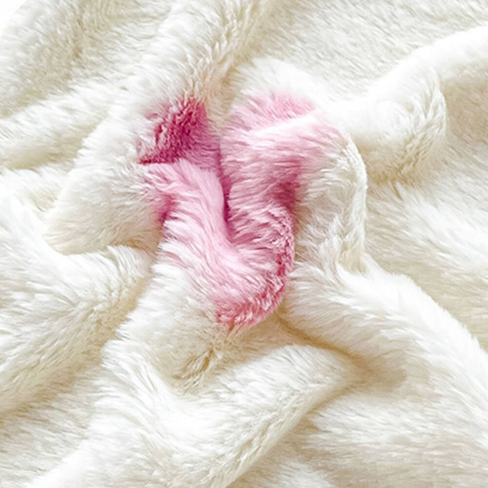 Close-up of luxurious milk velvet fitted sheet texture, ideal warm bedding home decor.