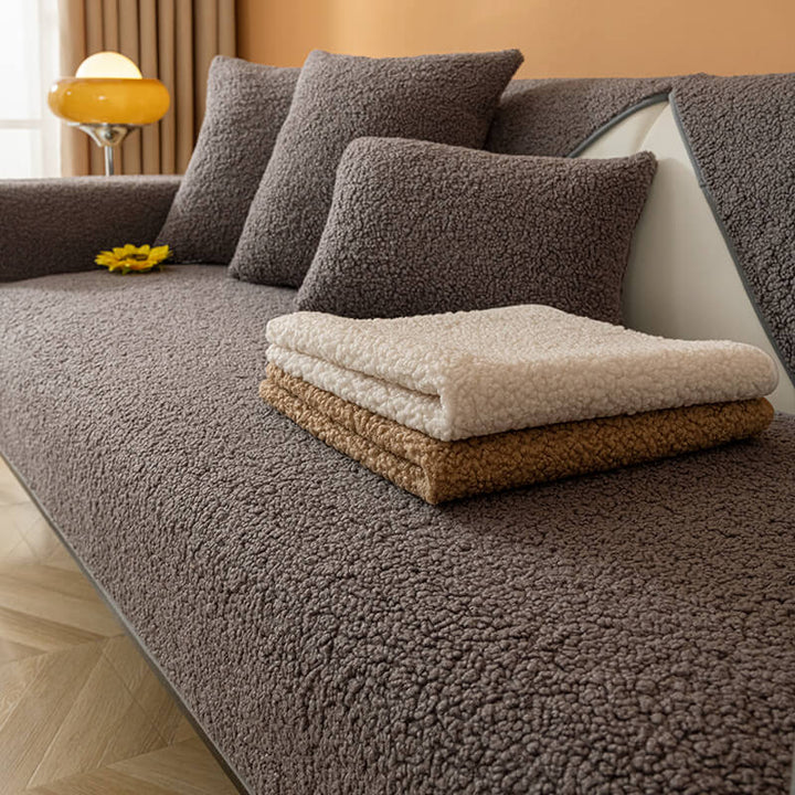 Burgundy plush teddy fleece non-slip couch cover, adding warmth and protection to a sofa.