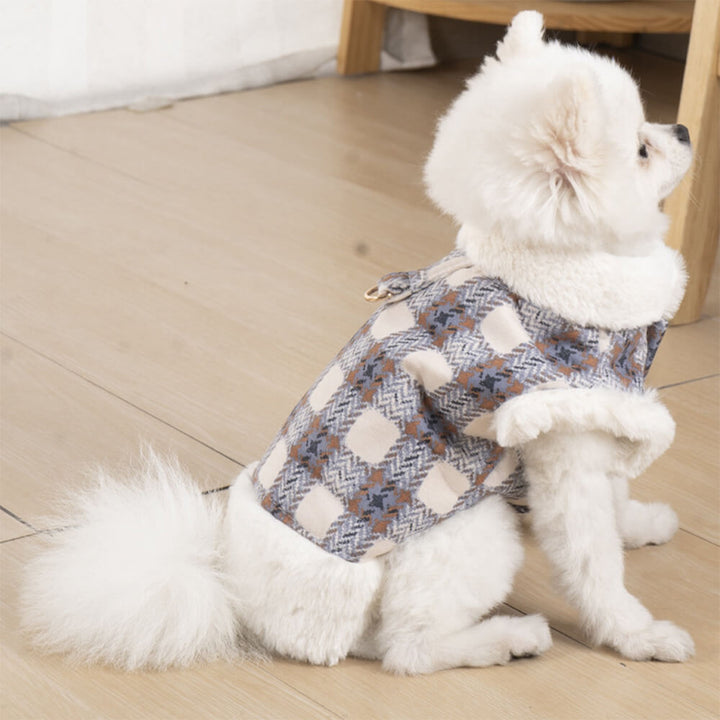 Close-up of soft plaid fleece fabric on a dog's winter pullover jacket