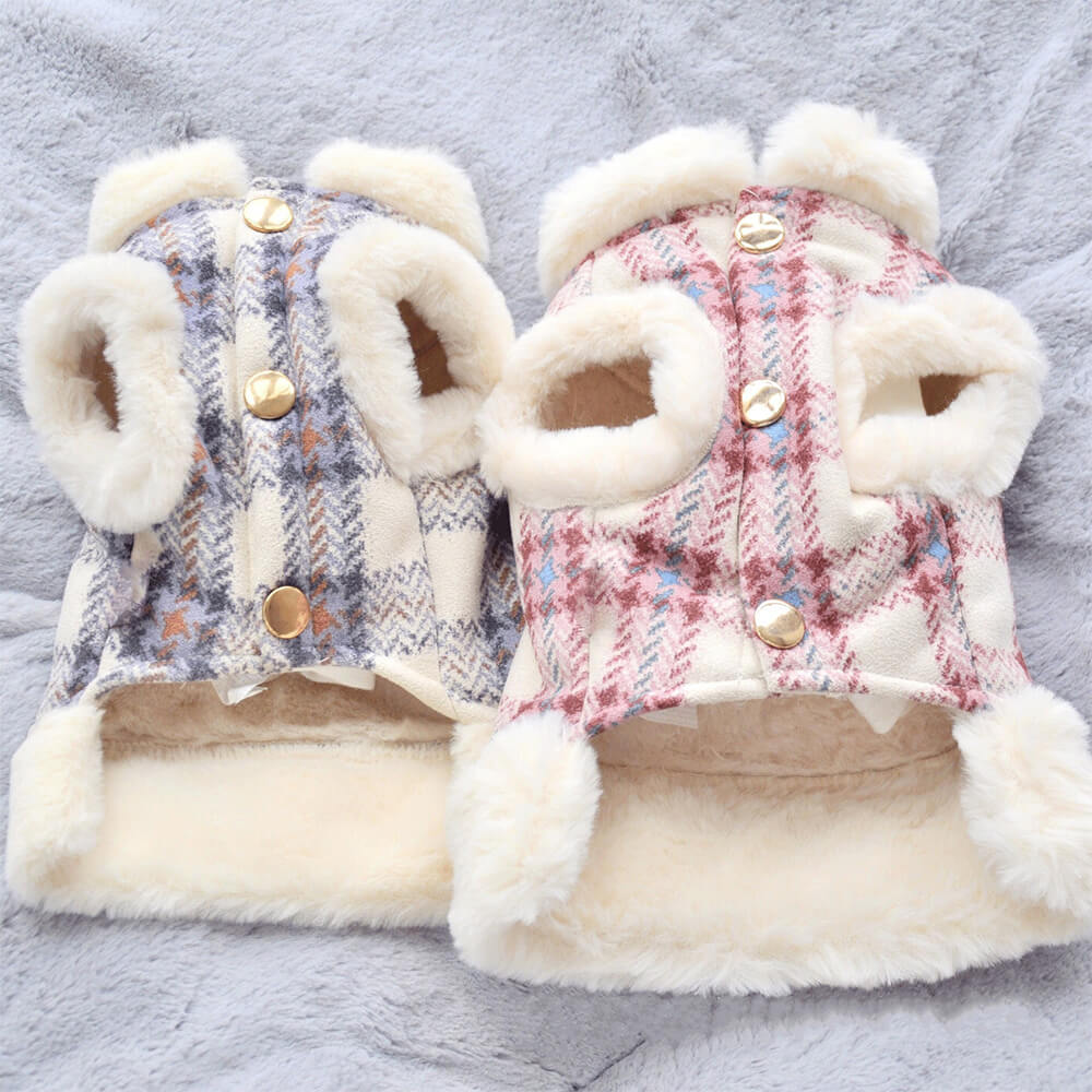 Puppy wearing a warm blue plaid fleece dog jacket, perfect for outdoor play