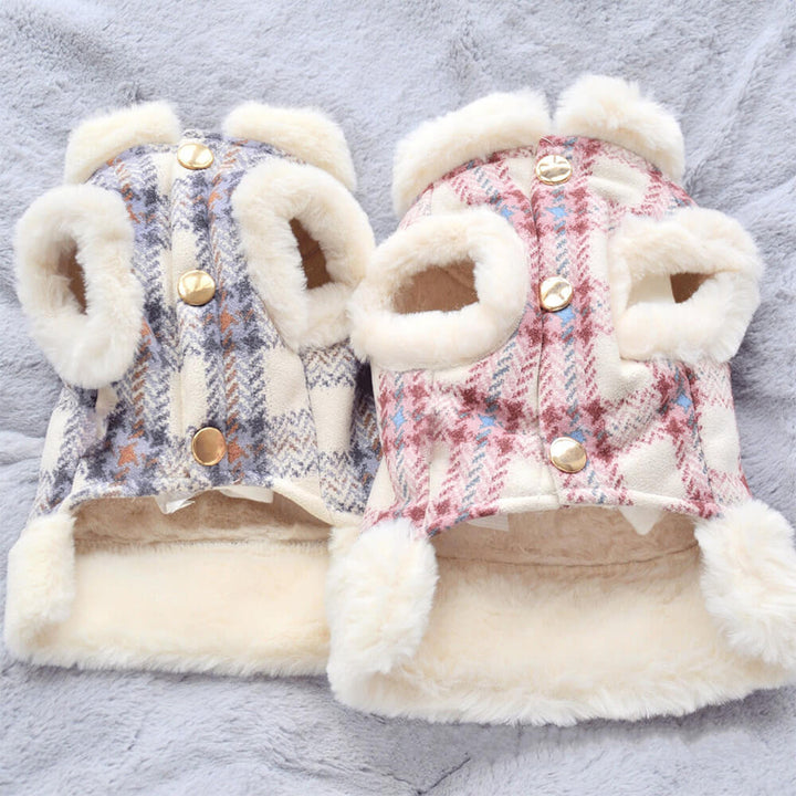 Puppy wearing a warm blue plaid fleece dog jacket, perfect for outdoor play