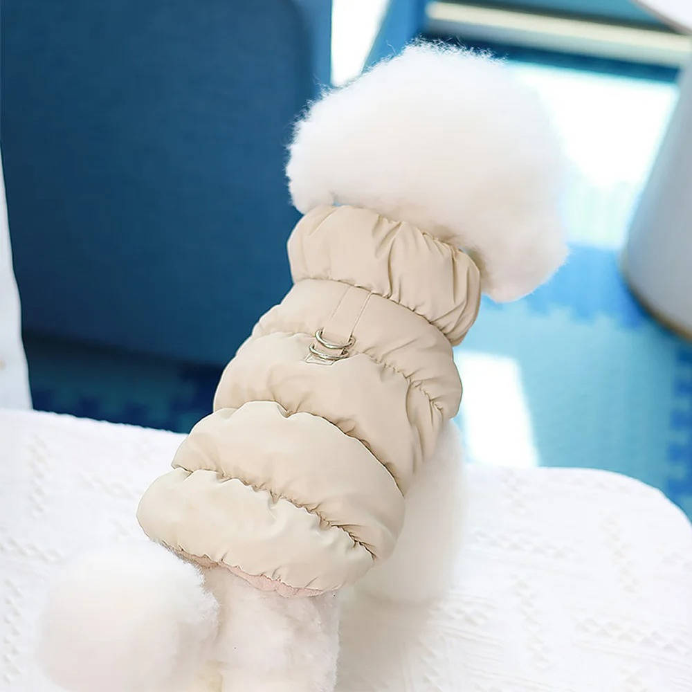 Outdoor dog gear: a practical grey winter jacket with fleece lining, suitable for small to medium pets.