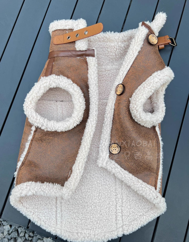 Soft blue fleece dog vest, featuring a convenient leash hook for secure and comfortable winter walks.
