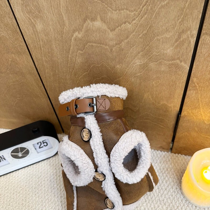 Close-up of integrated leash hook on a soft fleece dog vest, highlighting practical winter pet apparel.
