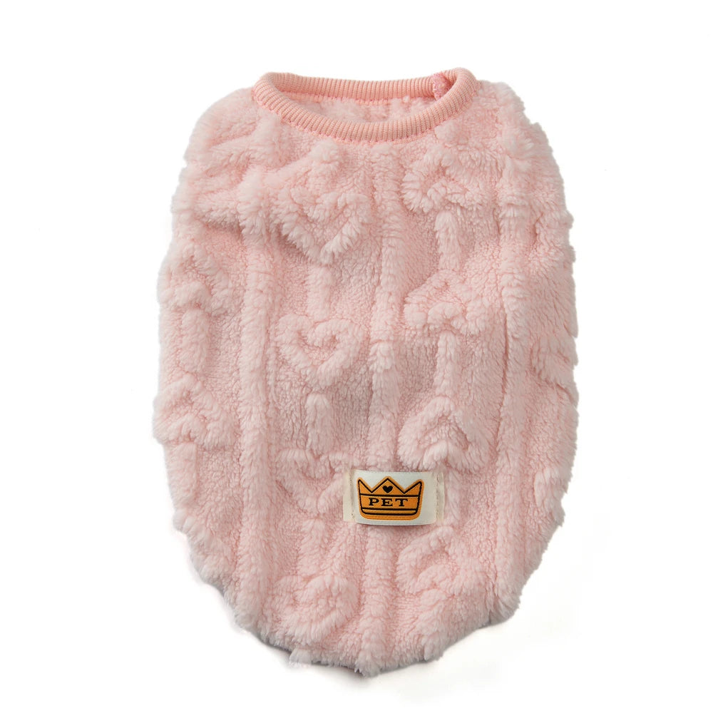 Close-up of a cozy pet jacket in green, perfect for small dogs or cats in winter