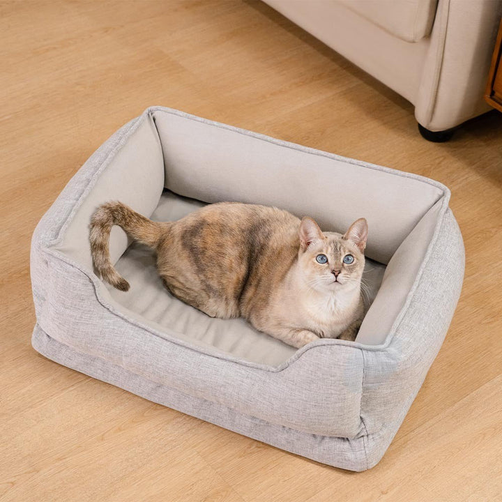 Close-up of soft fabric on a bolster pet bed, washable and non-slip for cats, easy clean