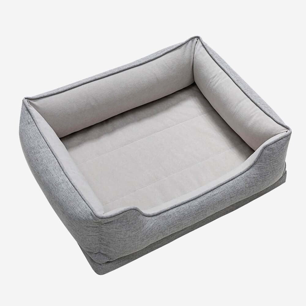 Durable non-slip base of a washable bolster pet bed for cats, ensuring pet safety