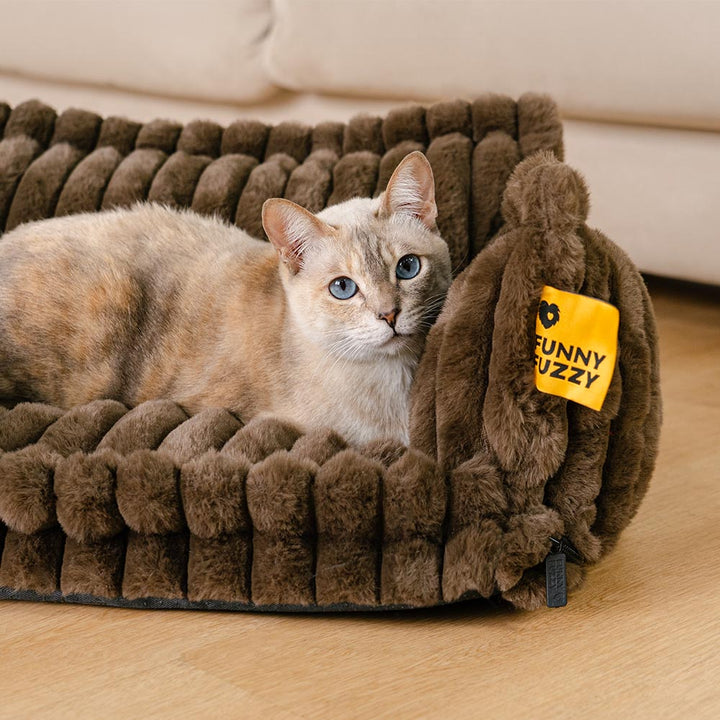 Soft washable cat bed with circular design, perfect for calming and sleep