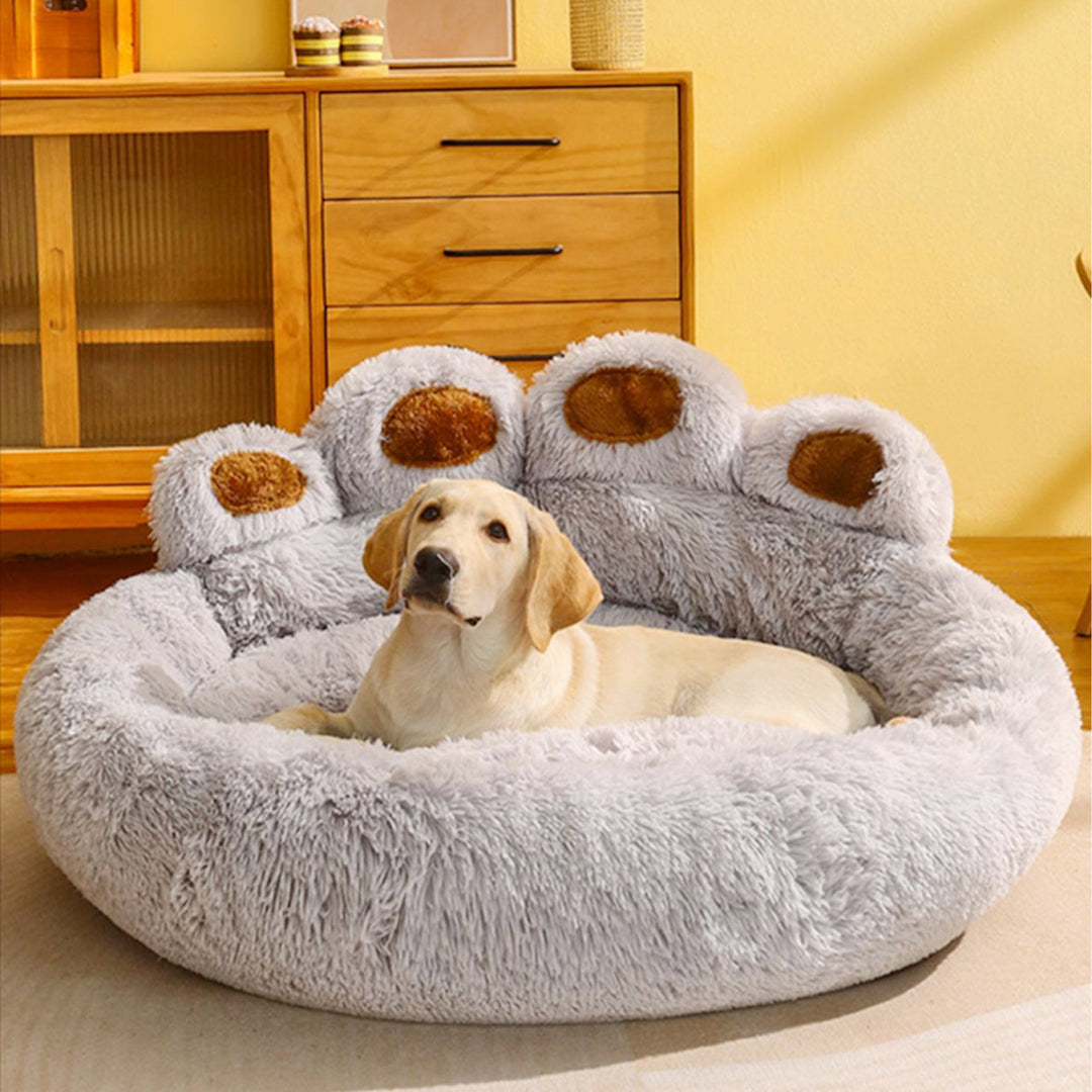 Washable fluffy donut pet bed in gray, perfect for small dogs or cats, offering cozy comfort.