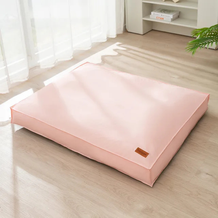 Close-up of an easy-clean, water-resistant dog bed with a durable fabric texture.