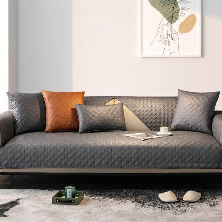 Close-up of a waterproof faux leather sofa cover texture, showcasing its durable and easy-to-clean surface.