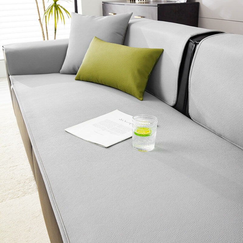 Top view of a full couch protected by the pet-friendly, waterproof furniture cover.