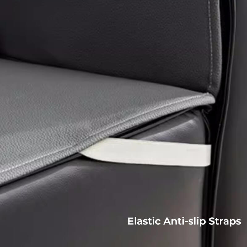 Water droplets beading on the surface of the water-resistant sofa protector, demonstrating its function.