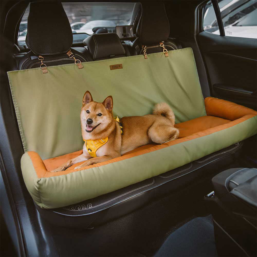 Waterproof anti-slip dog car seat cover, black, protecting car interior during pet travel.