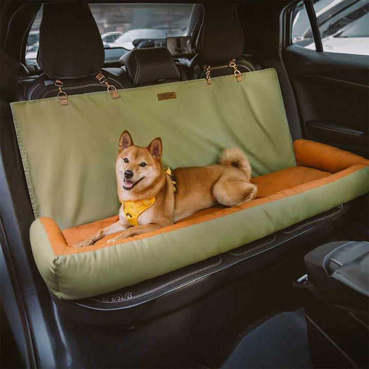 Waterproof anti-slip dog car seat cover, black, protecting car interior during pet travel.