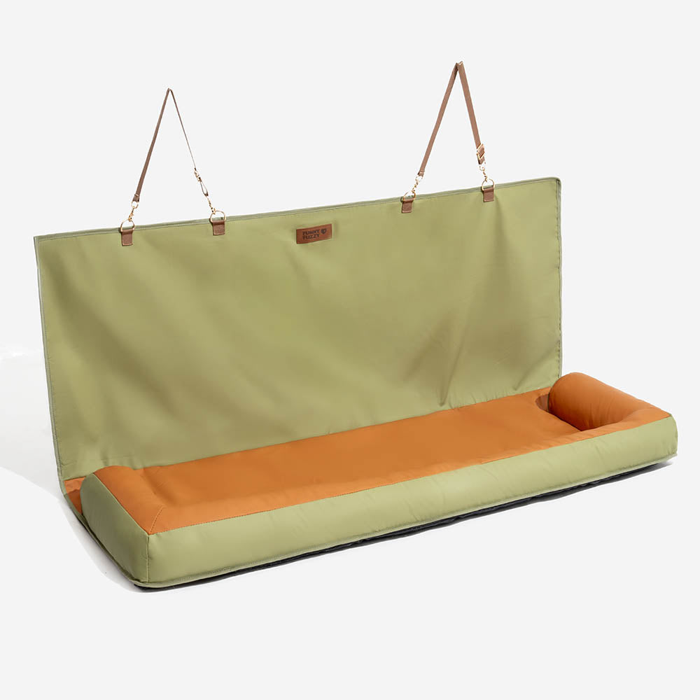 Rear view of waterproof anti-slip dog car seat cover with headrest anchors for stability.