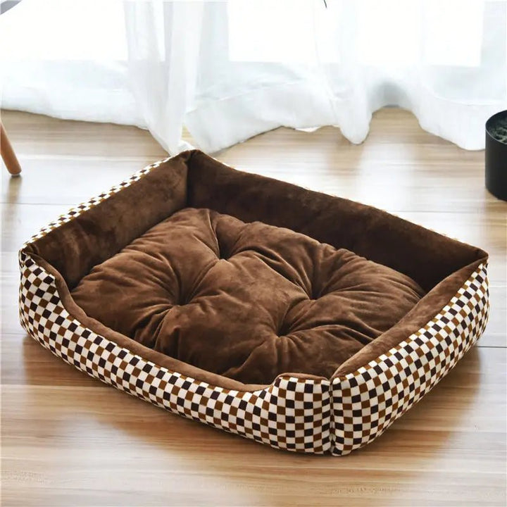 Unisex pet bed in a home setting, grey bolster style, waterproof and cozy