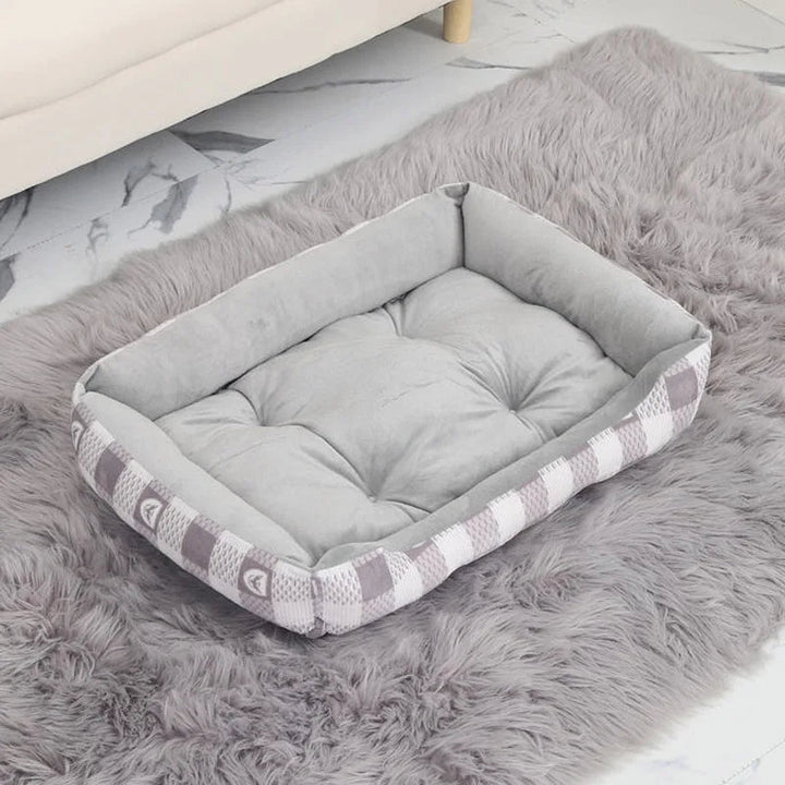 Waterproof pet bed with elevated bolster for ultimate dog and cat comfort & support