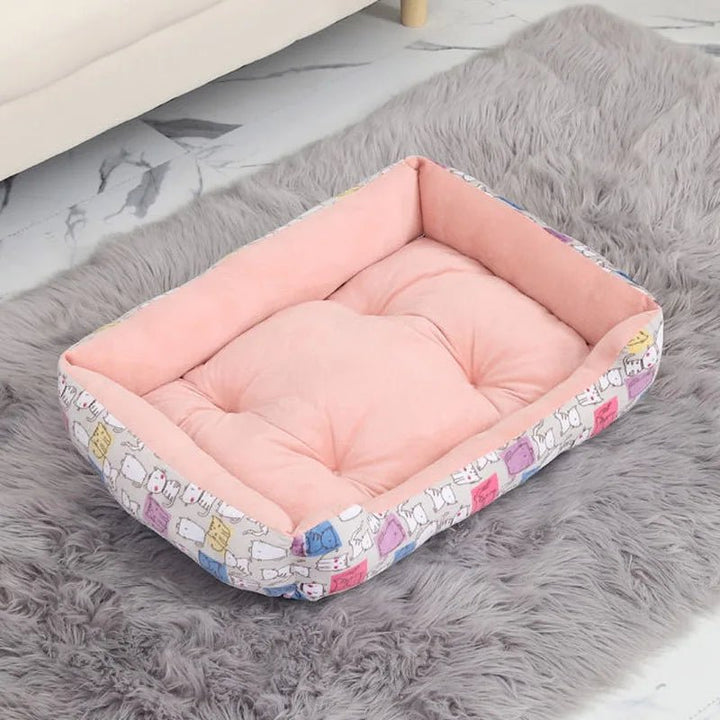 Detail of durable waterproof fabric of a grey bolster pet bed, soft to touch