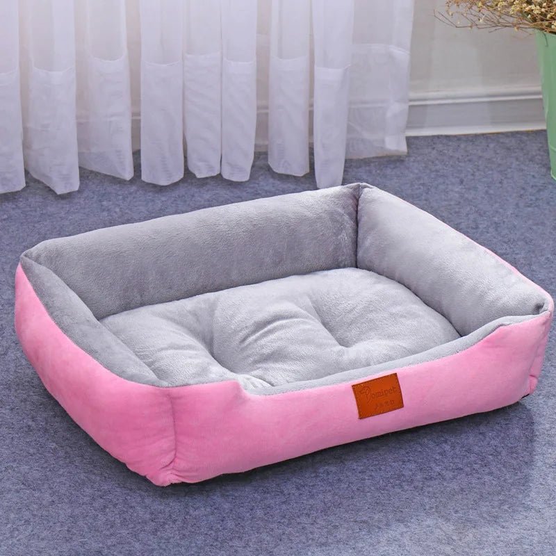 Waterproof pet bed side view, showing high bolster for head & neck support