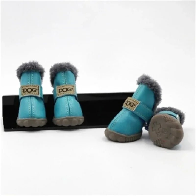 Red waterproof dog boots with soft fleece lining, ensuring warmth and protection for winter outings.