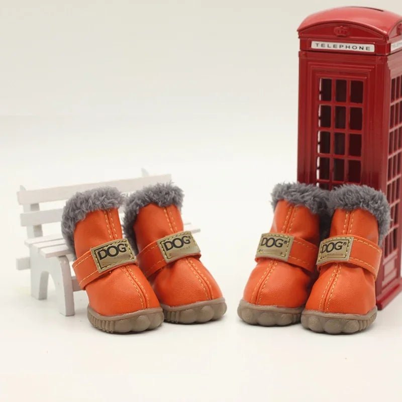Waterproof, fleece-lined dog boots in blue, providing superior paw protection during winter and cold.