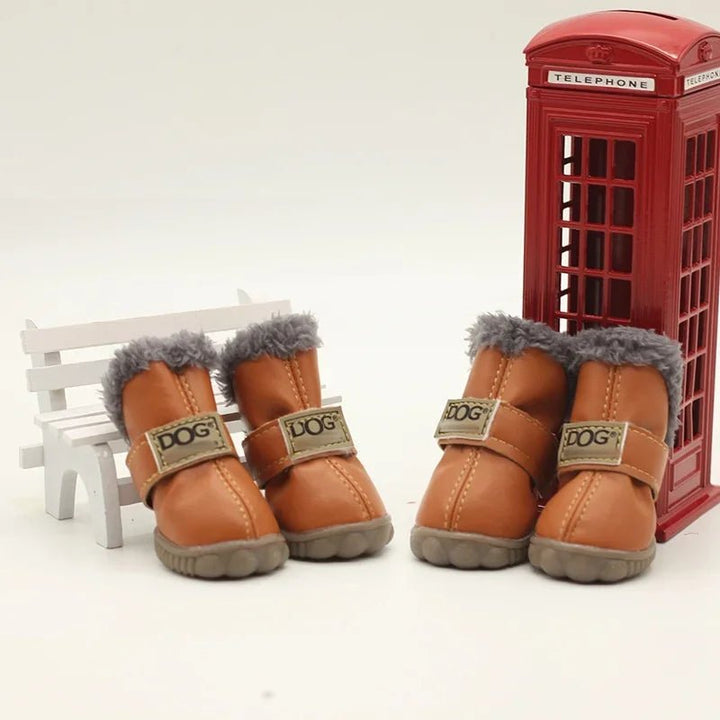 Waterproof dog boots featuring a non-slip rubber sole and warm fleece interior for winter paw care.