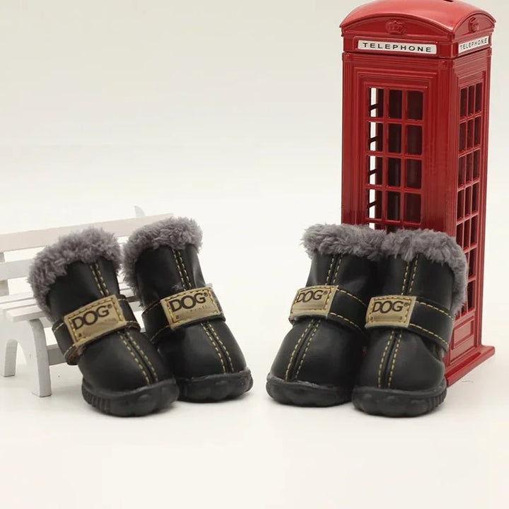Adjustable waterproof dog boots for effective paw protection against cold, snow, and ice in winter.