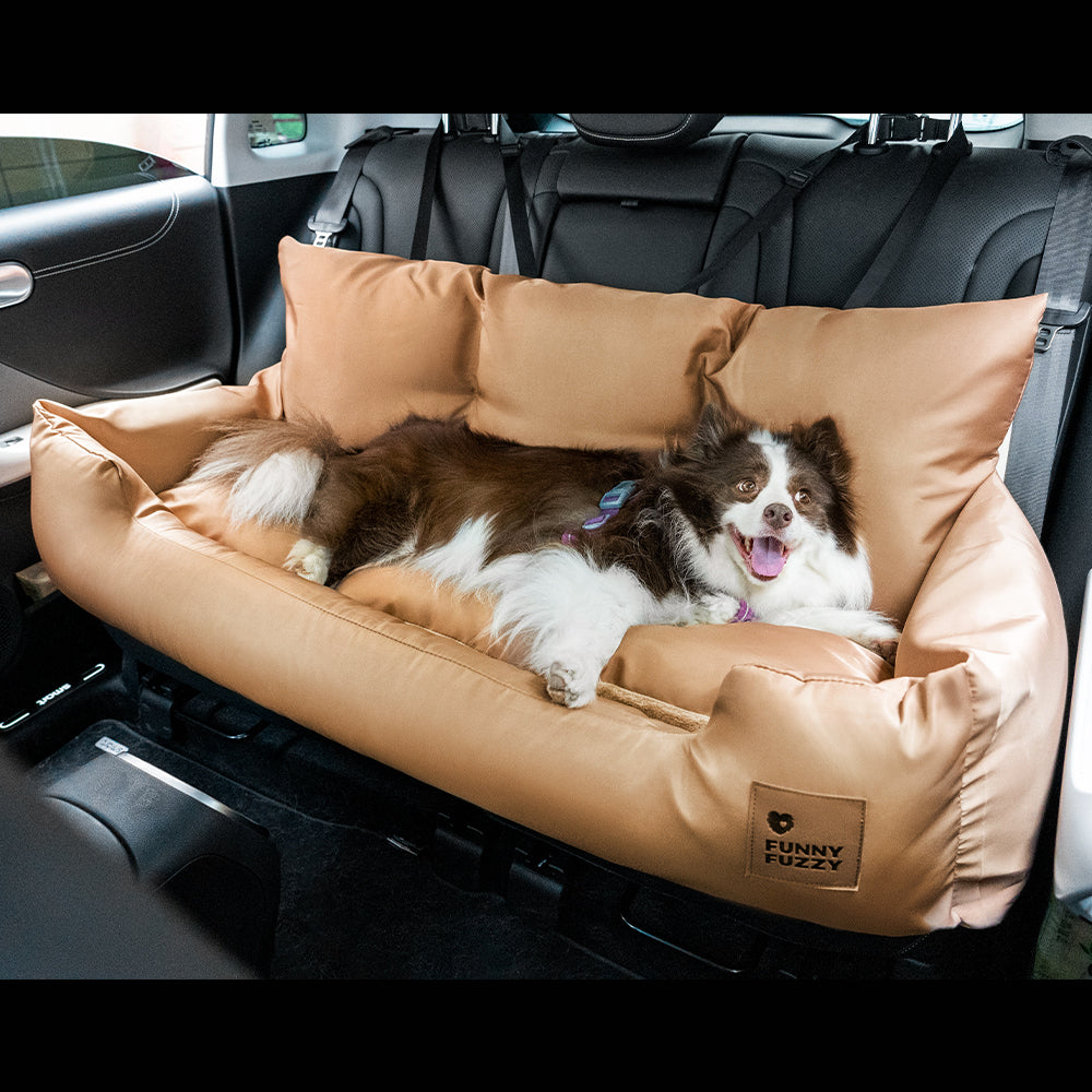 Large dog resting peacefully on a washable waterproof car seat bolster bed