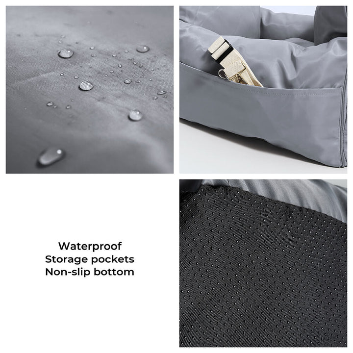 Happy large dog relaxing in a gray waterproof car seat bolster bed for travel