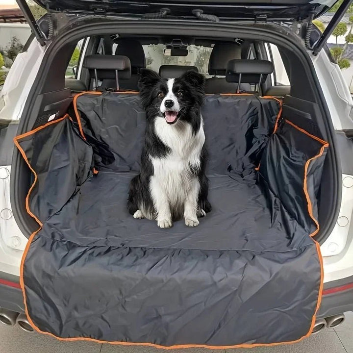 Waterproof dog car seat cover in black oxford fabric protecting a backseat, non-slip design for pet travel.