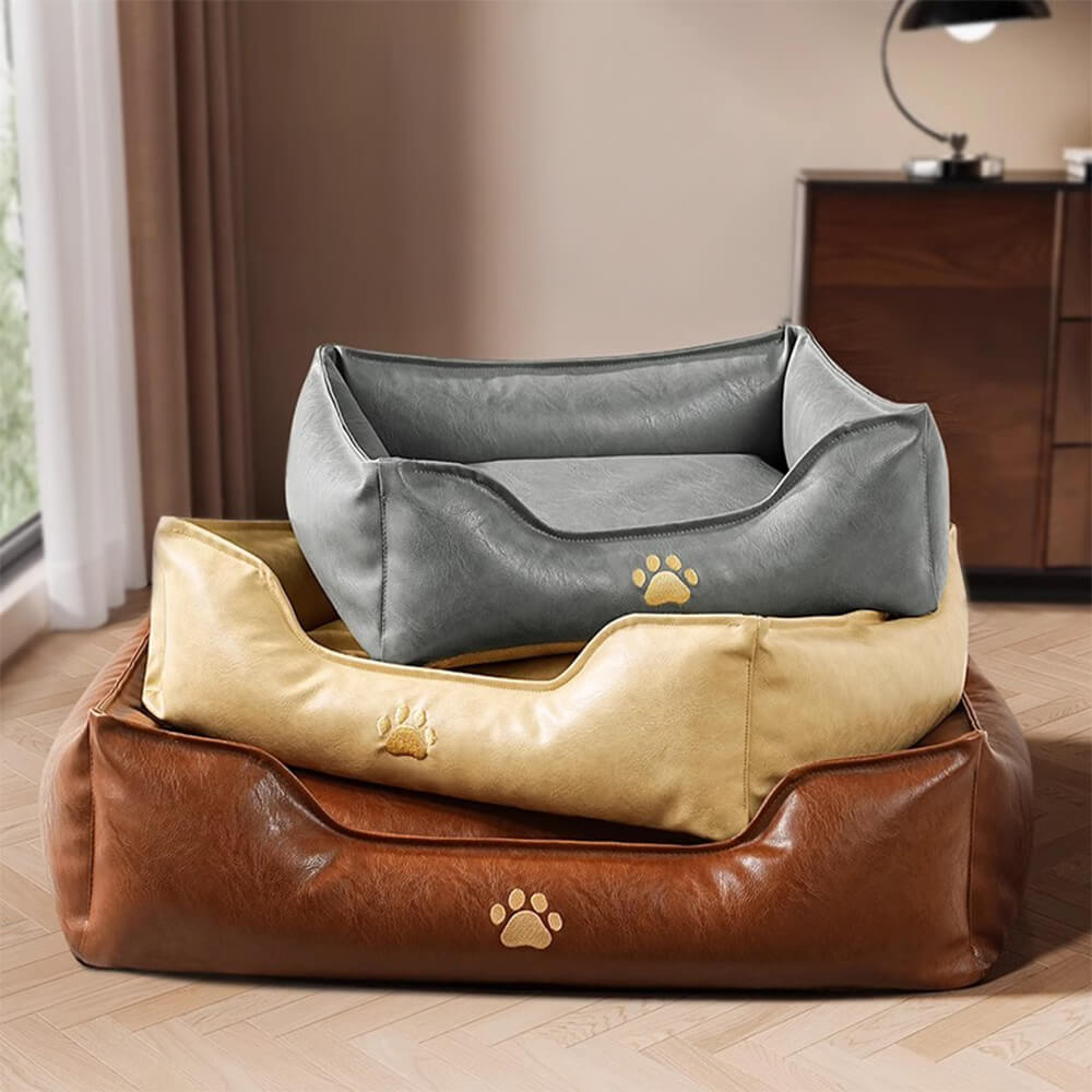 Waterproof faux leather dog bed with a removable cushion, practical and washable pet sofa for home use